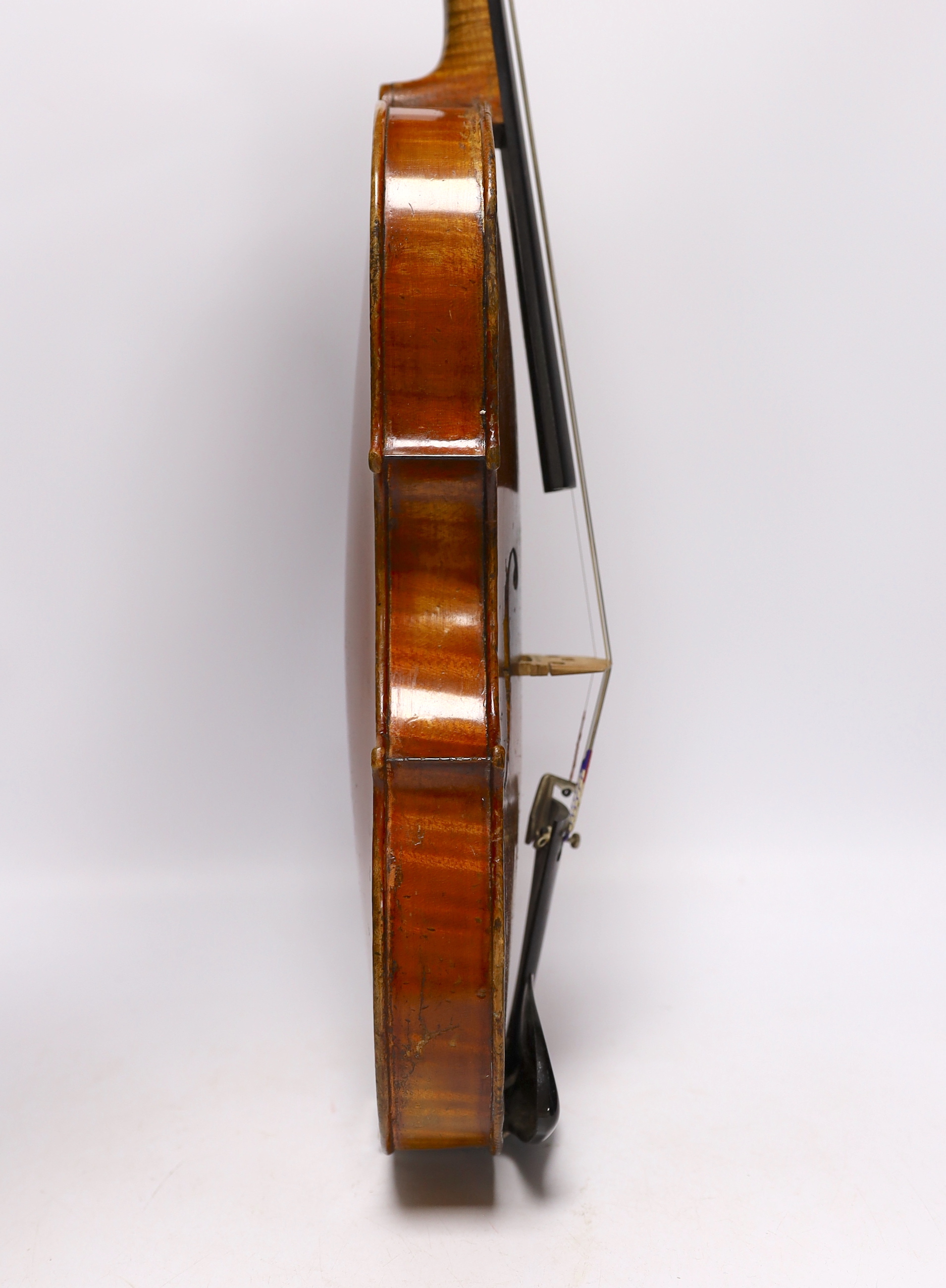 A cased late 19th/early 20th century French violin, bears Joseph Guarnerius label